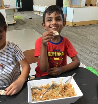 Tamariki-eating-dumplings